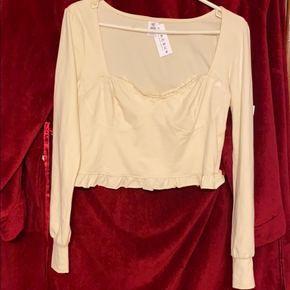 Beautiful Ivory ruffled low neck long sleeve shirt